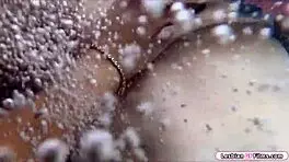 Tattooed lesbian dominates Asian lover with intense face sitting. Natural big tits add to wild orgasm.