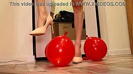 brunette amateur crushes balloons with heels in miniskirt