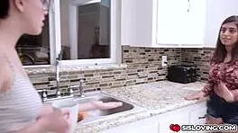 Busty stepsis intensely sucks stepbro's cock in bed while girlfriend watches TV