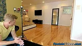 teen feels intense pleasure from footjob and cumshot on big tits