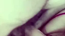 girlfriend on the balcony teases by playing with her wet pussy