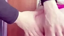 girlfriend on the balcony teases by playing with her wet pussy