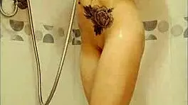 cute girl uses dildo in shower