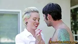 Petite teen pornstar kneels for blowjob leading to facial cumshot in high definition.