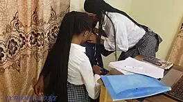 Teacher helps students after class