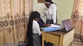 Teacher helps students after class
