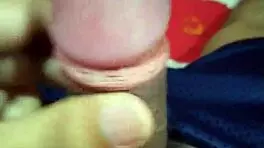 In the midnight hour, a young 18+ amateur indulges in passionate handjob masturbation, her body trembling with pleasure.