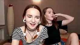 teen lesbians best friends exploring webcam fun with dildo and tits