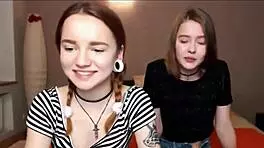 teen lesbians best friends exploring webcam fun with dildo and tits