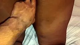 She gives a footjob then takes it in the ass for orgasm