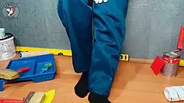 painter gets creative, teasing her tight wet pussy using her own worktools at the studio.