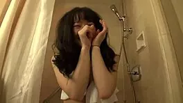 Beautiful Japanese teen 18+ girl with small tits and waist poses in a sexy bikini