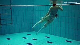 Dasha Explores Underwater Depths At The Beach