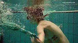 Dasha Explores Underwater Depths At The Beach