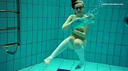 Dasha Explores Underwater Depths At The Beach