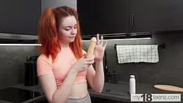 i feel so aroused watching this redhead girl play with her dildo in the kitchen