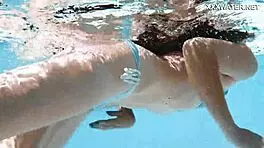 lana the hot chick swims nude underwater, showing her small tits