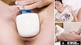 Petite Jane Wilde rolls her eyes intensely as she orgasms with Hitachi in up-close softcore scene.