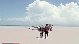 Agan anal threesome on the beach with a young 18+ ebony turns wild.