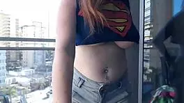 hot gamer girl flashing big boobs on balcony