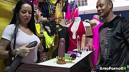 The best sex shop seller in the neighborhood shows off her big tits and ass while getting fucked with a monster cock.