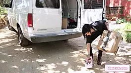 brunette and delivery girl engage in a suggestive strapon activity