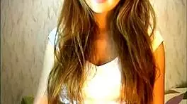 Is This Young Brunette Teasing On Webcam For You?