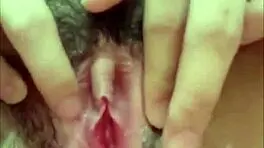 Asian teen fingers her tight wet pussy