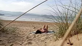 i filmed a curvy milf changing clothes and exercising naked on the beach