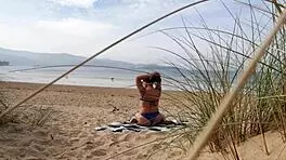 i filmed a curvy milf changing clothes and exercising naked on the beach