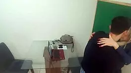 Student And Teacher In Classroom Discussion