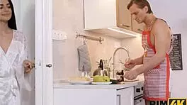 Seductive Brunette Enjoys Tonguing Her Man's Butt in Kitchen