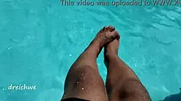 Feet in Pool with Lots of Water