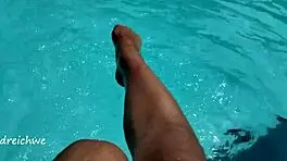 Feet in Pool with Lots of Water