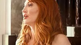 Redheaded Mature Woman Engages in Intimate Touching.