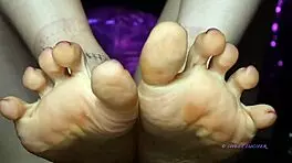 Look at my sweaty small feet with red polish in sensual female domination!