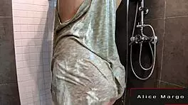 Blonde teen masturbates in shower with dildo