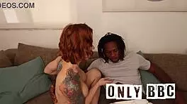 White Yoga Teacher Instructs Black Student In Class