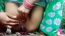 Hey, ever seen an Indian desi bhabhi release her juices in the jungle? Tell me how wild this wife gets!