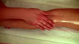 The beautiful brunette virgin gets her whole body oiled and massaged for the first time