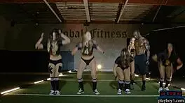 Sexy black teen 18+ strips and rips clothes during intense gym workout.