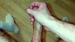 Young amateur masturbates huge cock to orgasm and cum