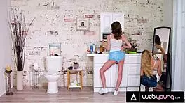 Petite Lily Larimar explores life with new roommates in bathroom.