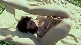 Petite girl Mary Kate Wilson bates solo on a lush meadow