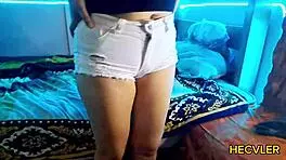 She lost at cards and ended up undressing herself in this sexy amateur video.