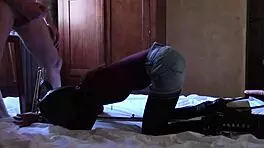 Tied to machine masked hooded, she sucks big european cock in bdsm bound scene