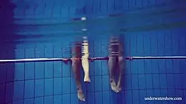 Marusia and melisa darkova bathe in bikini underwater.