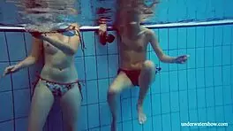 Marusia and melisa darkova bathe in bikini underwater.