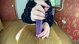 i love watching this oiled milf jump on a big dildo