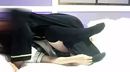 Asian couple in uniform cosplay kisses and fucks on bed